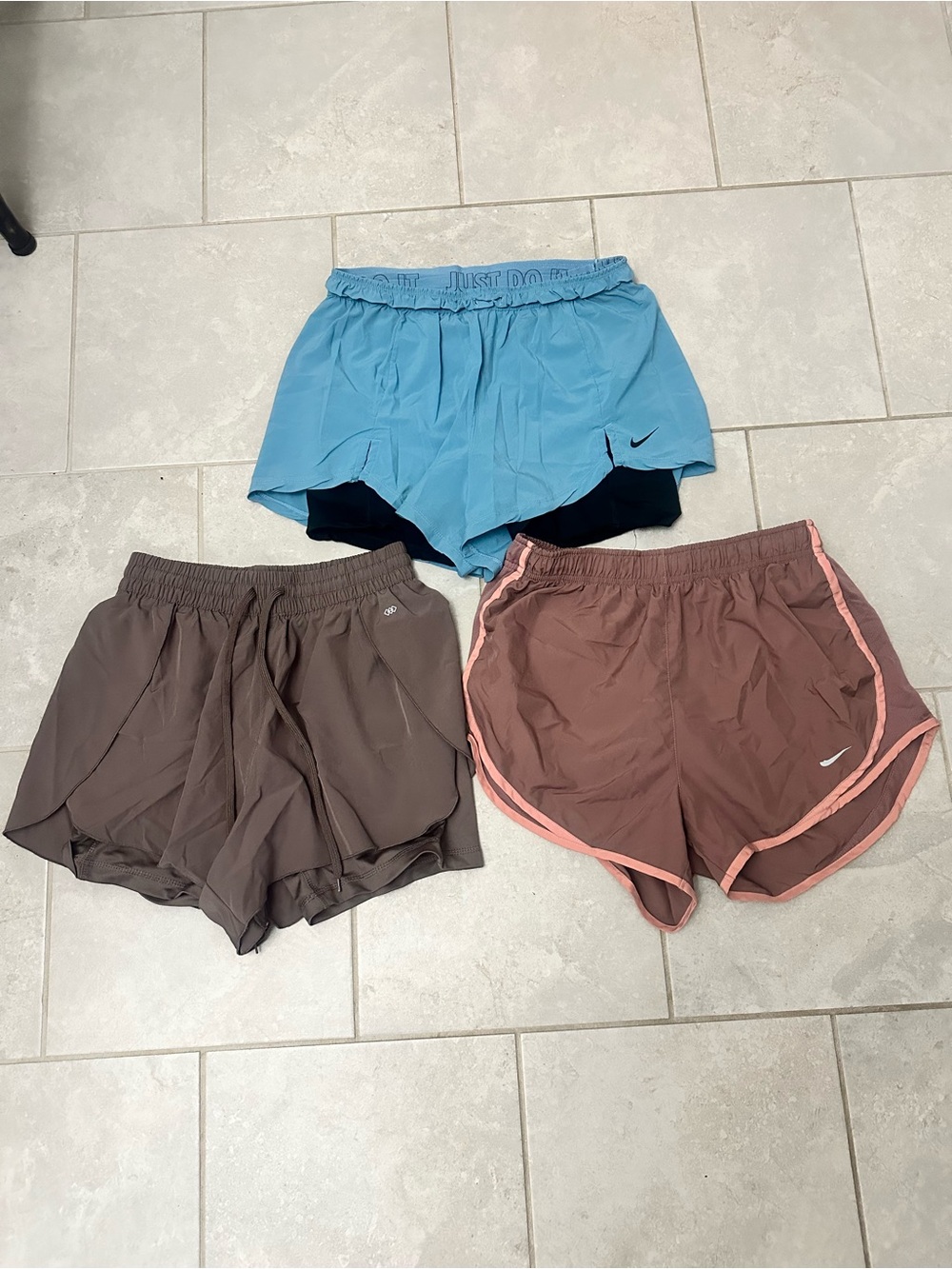 Women’s medium bundle of Nike Light Blue and pink, Brown Athletic Shorts